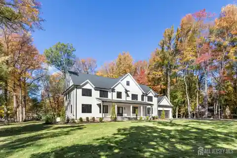 Luxury Residence Featuring Designer Lighting and Millwork
