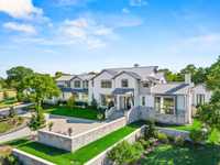 EXQUISITE CUSTOM ESTATE IN THE PRESTIGIOUS QUAIL HOLLOW ESTATES
