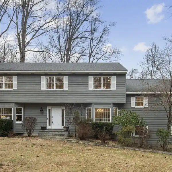 QUINTESSENTIAL CENTER HALL COLONIAL IN A GREAT LOCATION