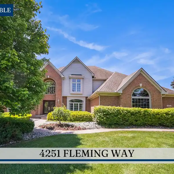 IMPRESSIVE CUSTOM-BUILT HOME ON PROFESSIONALLY LANDSCAPED LOT