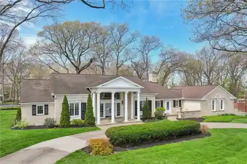 Expansive Residence on Meticulously Landscaped Grounds