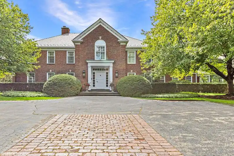 Timeless Brick Georgian Estate on a Picturesque Lot