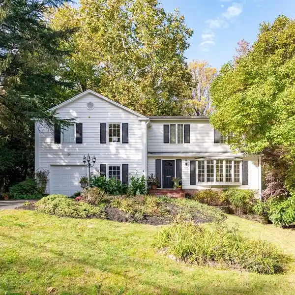 PRIVATE BACKYARD OASIS WITH WOODED VIEWS & BRICK PATIO