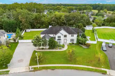 Striking White Stone and Stucco Colonial