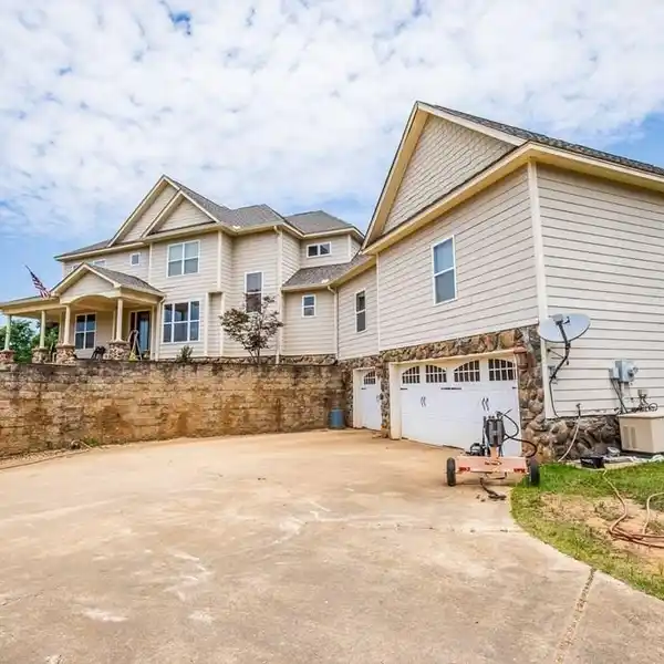 TWO HOMES ON 75 ACRES