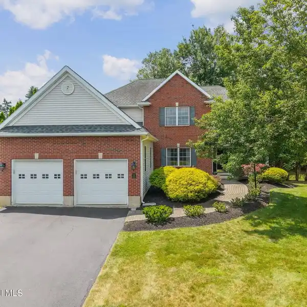 ELEGANT COLONIAL WITH COVERED PORCH AND DECK