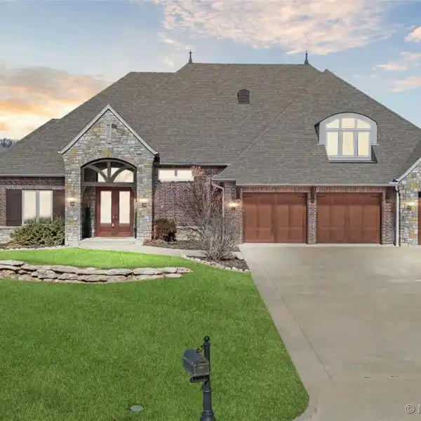 CUSTOM HOME WITH HEATED POOL AND GARAGE SHOP