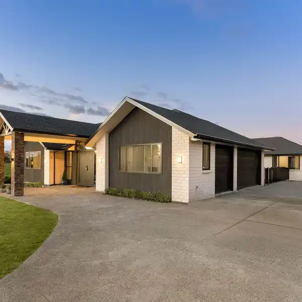 NORTH-FACING BRICK ESTATE WITH TRIPLE GARAGE