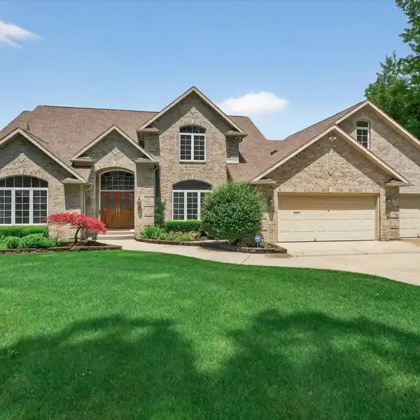 WATERFRONT RETREAT WITH 4+ ACRE BACK LOT