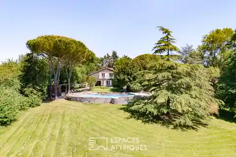 Elegant 1850 Farmhouse on Lush Parkland