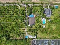 FULLY REMODELED 10-ACRE COMPOUND