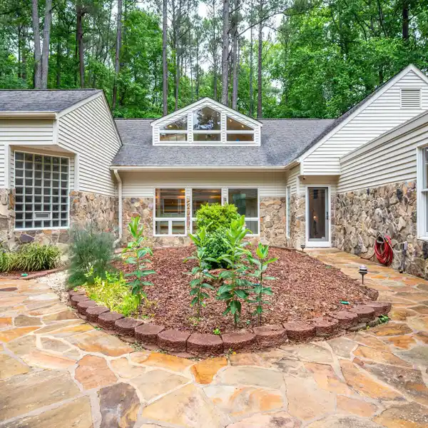 CONTEMPORARY STONE RETREAT ON 4 SERENE ACRES