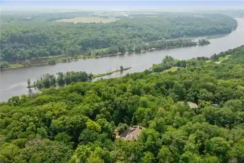 Sophistication and Natural Tranquility on Five Wooded Acres