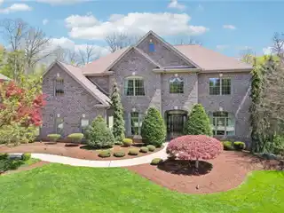 Beautiful Brick Home on Park-like Property
