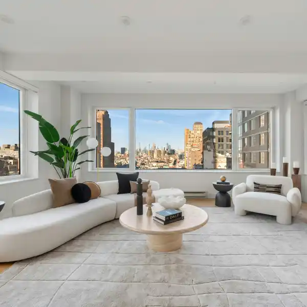 LUXURIOUS THREE BEDROOM HOME IN A FULL-SERVICE PREWAR LOFT