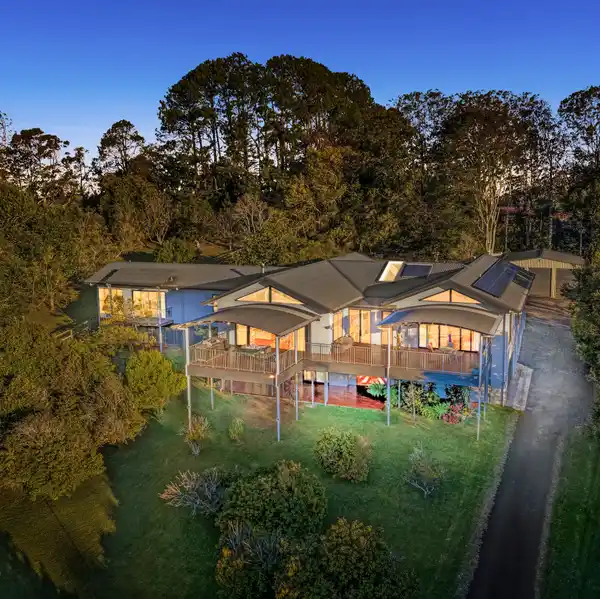 EXPANSIVE SANCTUARY ON TWO MANICURED ACRES