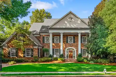 Custom Built Lake Front Executive All Brick Home
