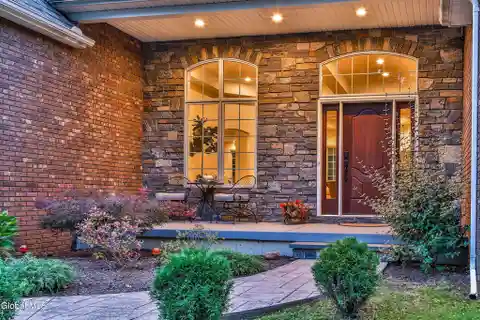 Custom Brick Beauty with Backyard Vacation Oasis