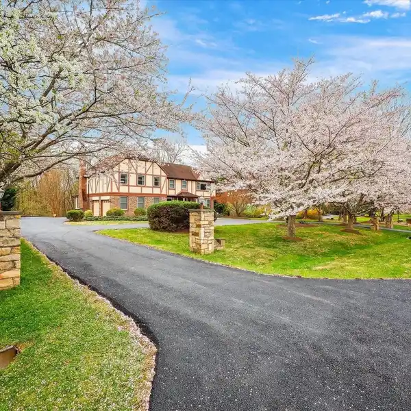 SPACIOUS TUDOR HOME BACKING NATIONAL PARKLAND