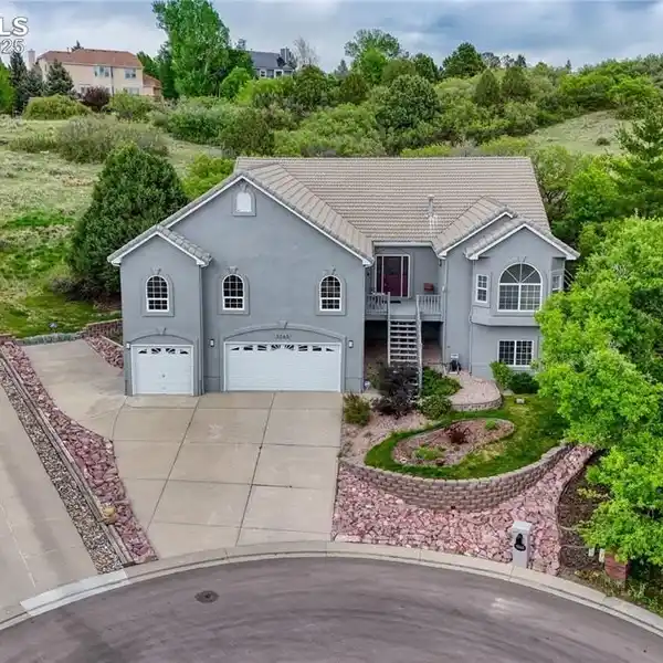 ONE-OF-A-KIND HOME IN COVETED SUNSET MESA