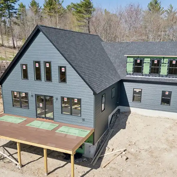 CUSTOM HOME FEATURING IDYLLIC LAKE VIEWS