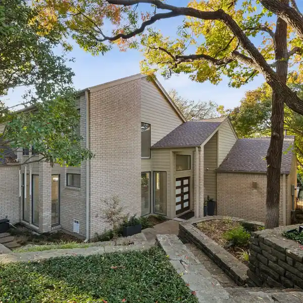 BEAUTIFULLY UPDATED HOME IN A SECLUDED CREEK SETTING