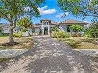 SOPHISTICATED, CUSTOM-BUILT HOME AND TOP-SHELF LIVING EXPERIENCE