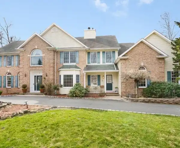 LOVINGLY MAINTAINED CENTER HALL COLONIAL
