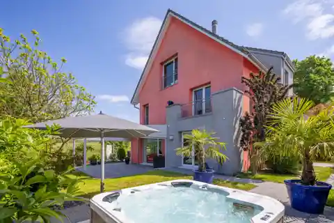 Family Residence with Garden Oasis and Large Garage in Hochfelden