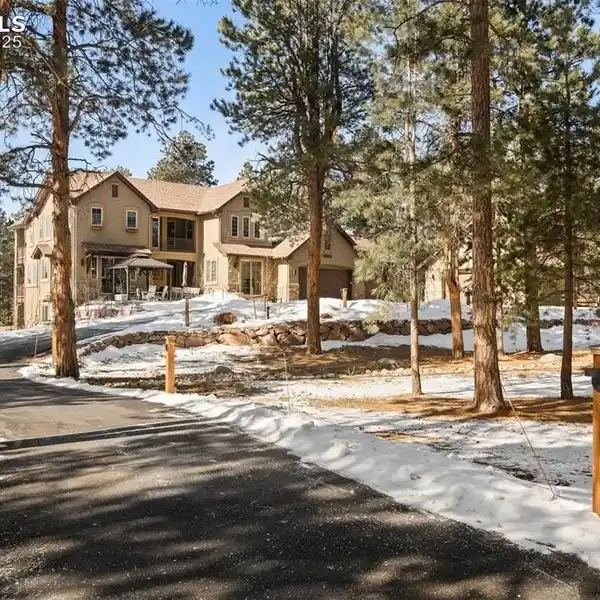 ENCHANTING CUSTOM HOME IN EXCLUSIVE GATED COMMUNITY
