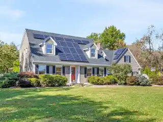 Beautifully Maintained Custom Cape Cod Home