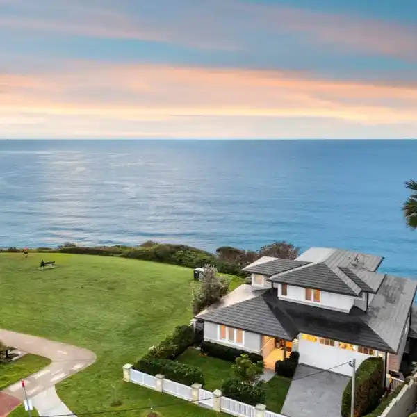 ARCHITECTURAL COASTAL MASTERPIECE WITH HEATED MINERAL LAP POOL
