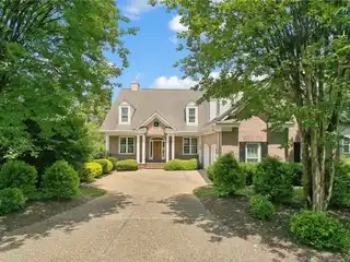 Timeless Brick Estate with Captivating Water Views