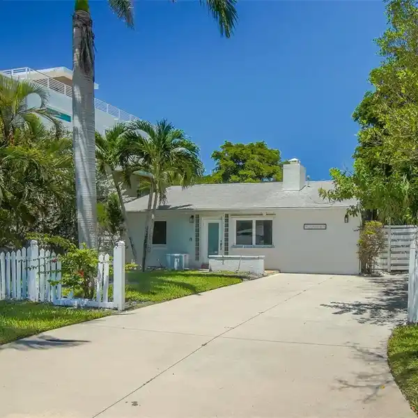ELEVATED COASTAL LIVING ON COVETED LIDO KEY