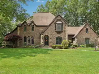 Grand Tudor Style with Heated Three-car Garage