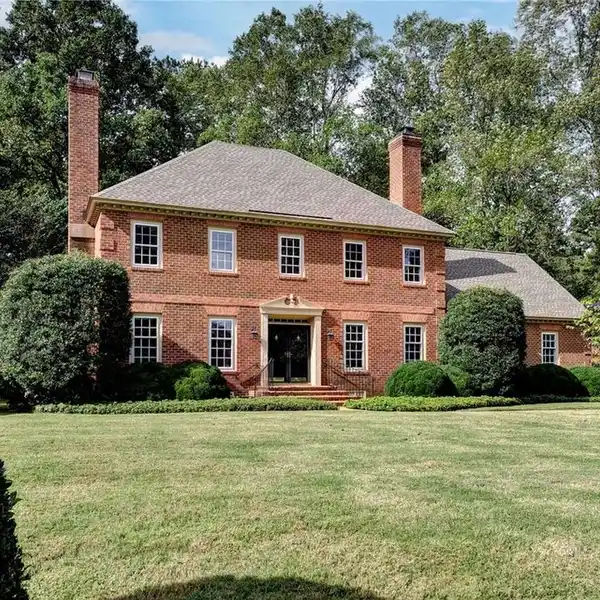 BEAUTIFUL ALL BRICK COLONIAL ON A PREMIER STREET