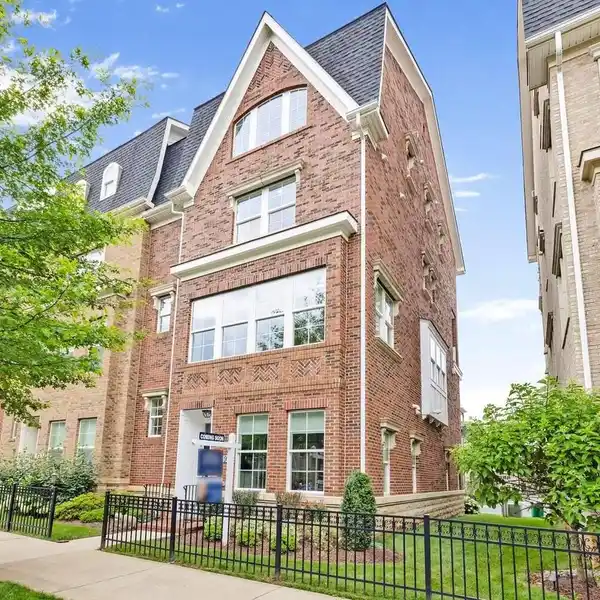 FOUR-LEVEL END-UNIT TOWNHOME IN CROWN
