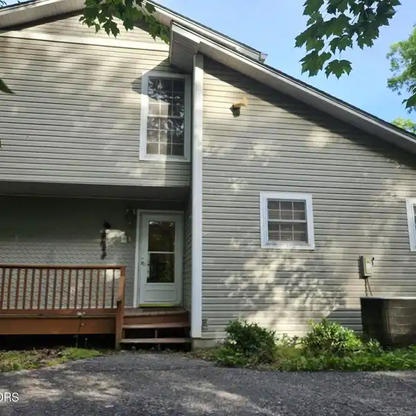 BEAUTIFUL HOME ON 84 ACRES OF STUNNING WOODED PROPERTY