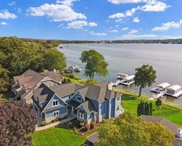LAKEFRONT LUXURY HOME WITH SWEEPING VIEWS