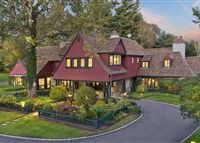 UNPARALLELED SIX BEDROOM STONE AND SHINGLE STYLE HOME