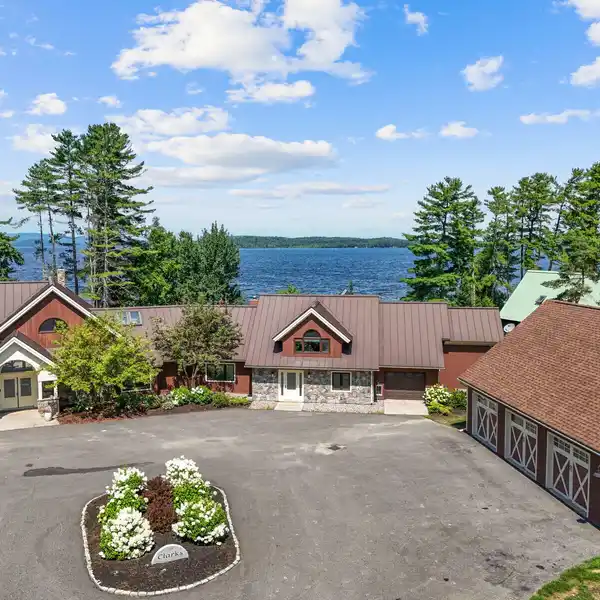 ELEGANT AND SPACIOUS LAKE HOME ON OVER TEN ACRES