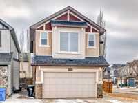 STUNNING FORMER SHOW HOME IN ASPEN WOODS COMMUNITY