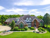 MAGNIFICENT LUXURY HOME WITH SUBSTANTIAL ACREAGE AND EQUESTRIAN FACILITIES