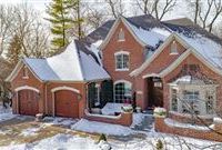 SPACIOUS CUSTOM HOME NESTLED AWAY ON WOODED SETTING IN SAYBROOK