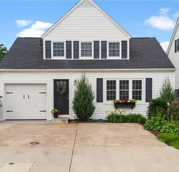 OPEN AND AIRY CAPE COD STYLE HOME