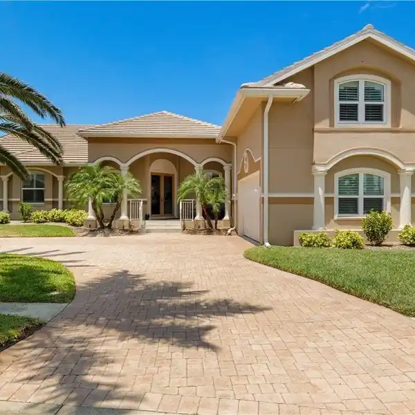 CUSTOM WATERFRONT HOME IN GATED CATALPA COVE