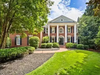 Exquisite White Columns Home in a Premier Community