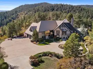 Fully Renovated Tudor Estate Atop 40 Acres