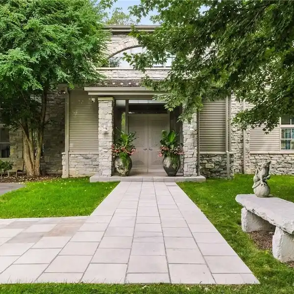 SPECTACULAR ESTATE ON 10-PLUS WOODED ACRES