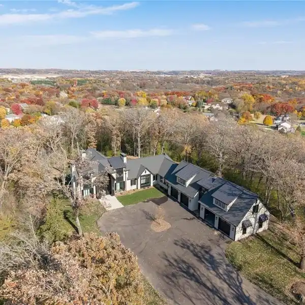ONE-OF-A-KIND RETREAT ON A SECLUDED WOODED ACREAGE